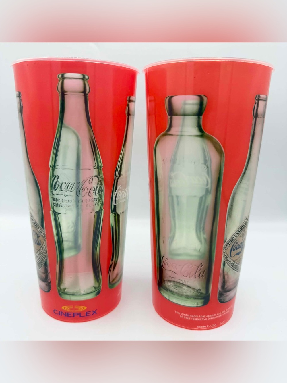 Cineplex-branded red plastic collectible cups